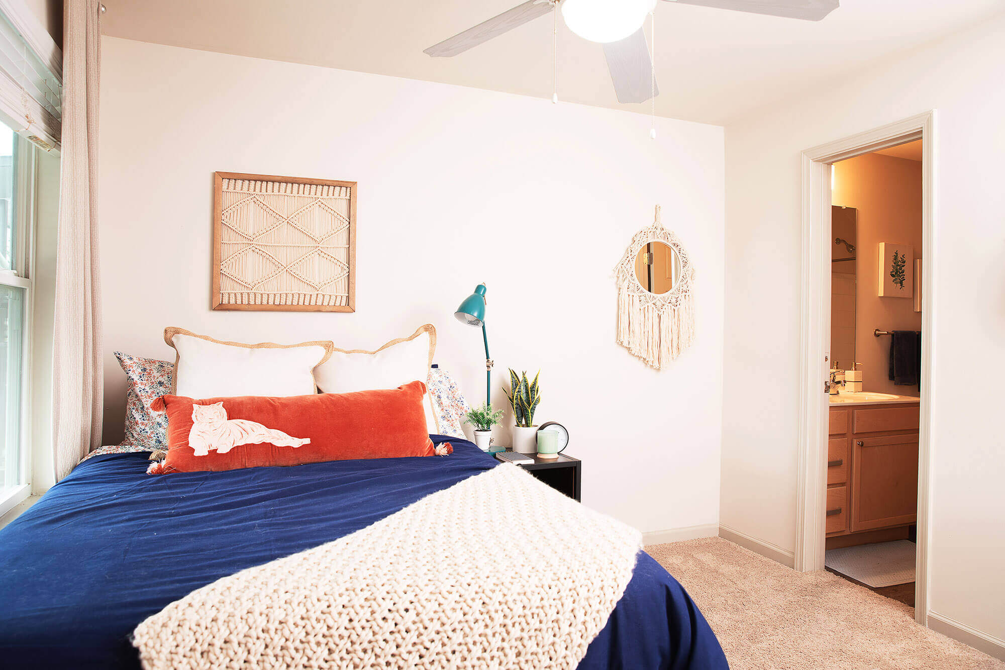 Wildwood Baton Rouge LSU Off-Campus Apartments Furnished Bedroom with Full Bed and Attached Bathroom